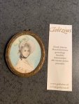  - Attractive miniature portrait of a woman with a hat with feathers and in beatiful dress painted on ivory.