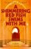 Shimmering Red Fish Swims w...