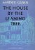The house by the leaning tree